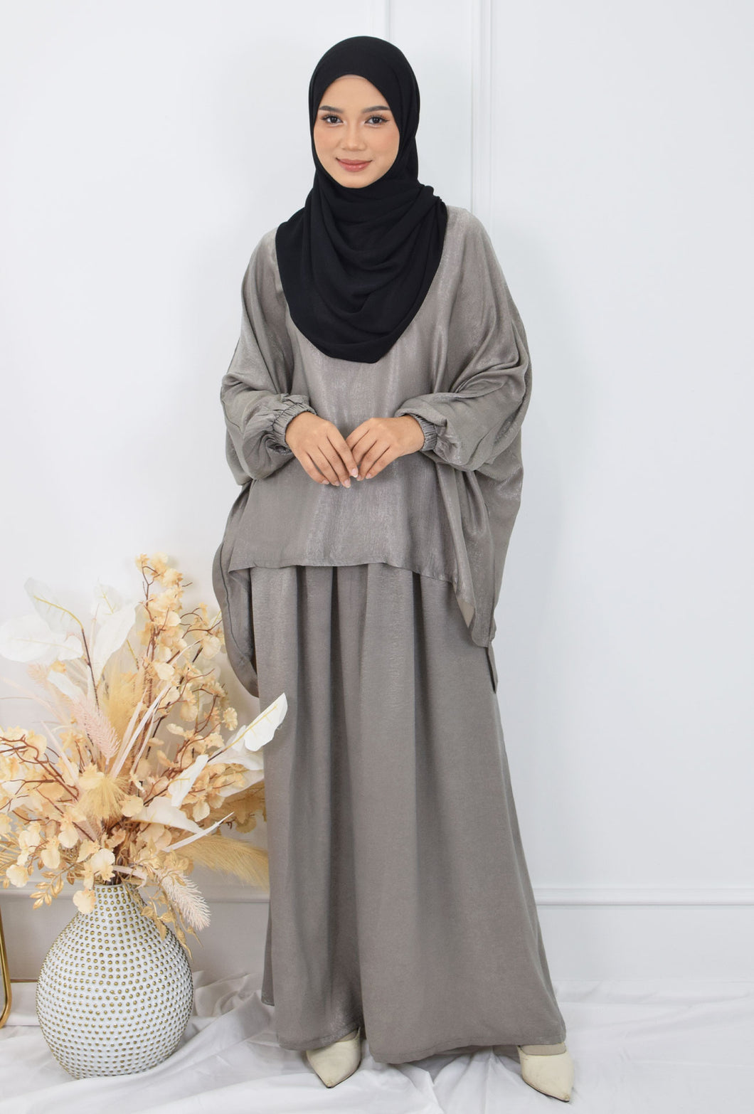 Faith Soffeya in Silver